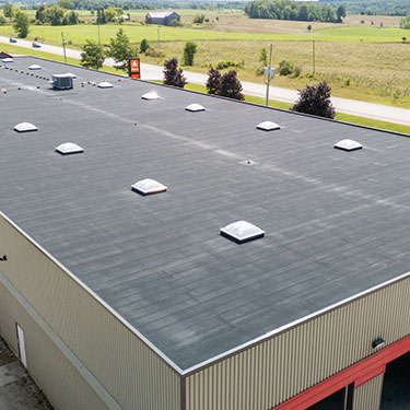 Commercial building with flat roofing